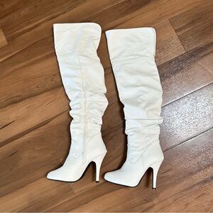 Thigh high white boots